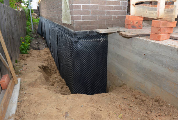 SJ Waterproofing Pros technician performing targeted Waterproofing assessment in Sheridan, OR